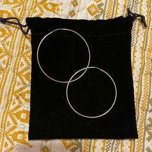 14K gold polished continuous hoop earrings